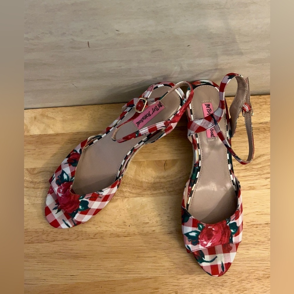 Betsey Johnson Athena wedge sandals in a red gingham and floral print.